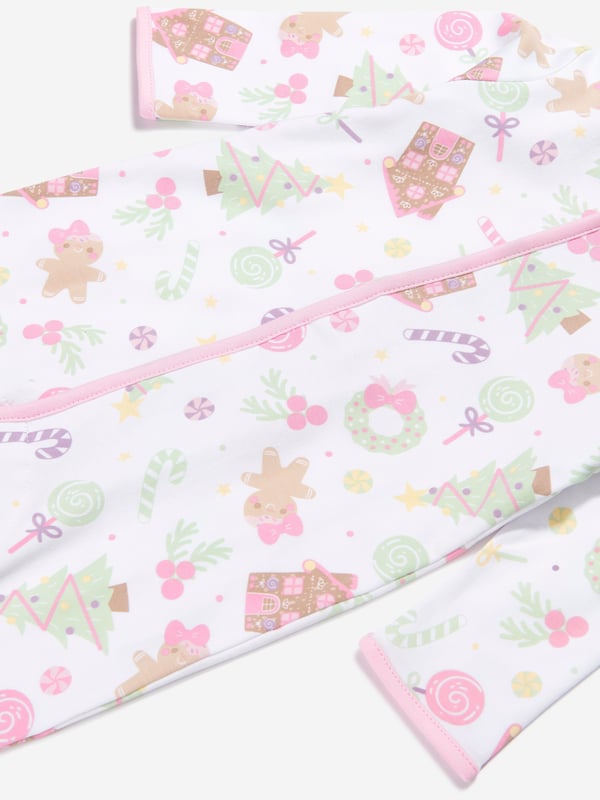 Introducing Magnolia Baby's exclusive Baby Girls Sweet Gingerbread Babygrow in Pink, a sublime addition to your Baby_Girls' wardrobe. Rendered in an elegant White hue, this piece exudes charm and style. Key features:  Whimsical Design: Featuring a delightful gingerbread print, this top adds a fun, chic vibe to your little one's outfit.  Comfy &amp; Cosy: Made from luxe materials, ensuring optimum comfort for your child's day-to-day escapades. Upgrade your Baby_Girls' attire with this elegant Babygrow from Magnolia Baby. Act fast, let your baby girl dazzle in this superior piece!