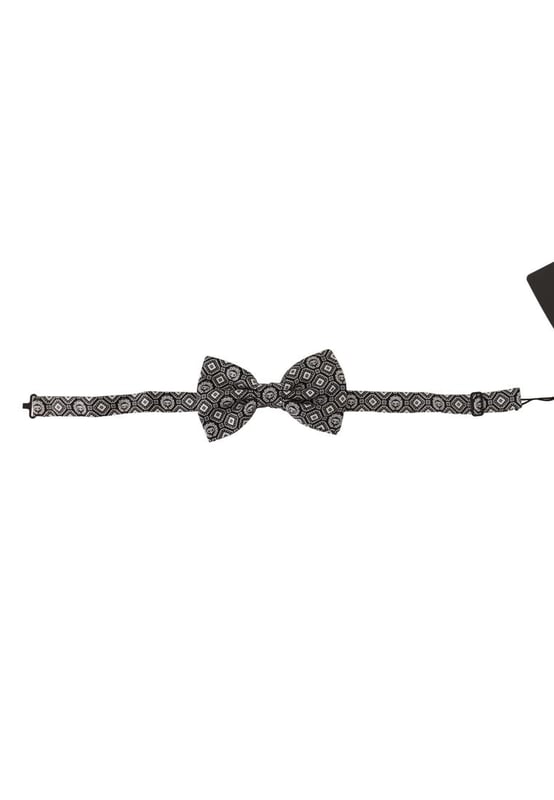 Stunning Dolce & Gabbana silk bow tie
  Brand new with tags
  Color: Black and White
  Model: Tied
  Material: 100% Silk
  Adjustable length neck strap
  One size
  Made in Italy
  Width: 7cm
Material: 100% Silk