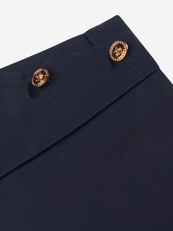 Versace envision bold, innovative abstracts in their beautifully crafted aesthetics. These baby girls navy shorts capture the Italian label's passion for daring and unparalleled technology. Crafted in a stunning gabardine design with Medusa buttons at the front and a comfortable elastic Greca insert at the back. They are complete with gold Medusa hardware and elegant front side pockets. Concealed Side Zip Closure Outer Composition: 100% Cotton Lining: 100% Cotton Trim: 82% Polyester, 9% Elastane, 9% Nylon