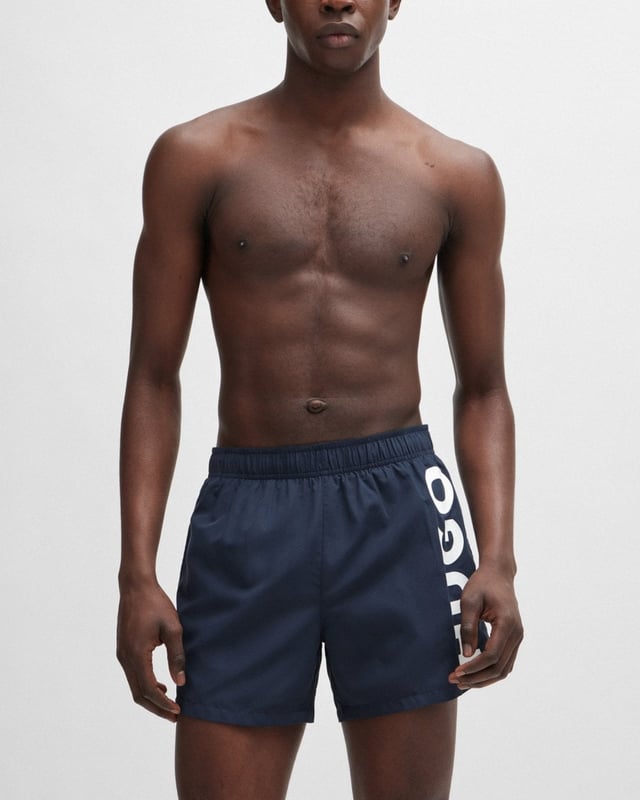 Modern swim shorts by HUGO. Designed in quick-drying fabric with full lining, this beach-ready pair features a vertical logo printed in contrast.
100% Polyester (recycled) , Lining: 100% Polyester
50513979