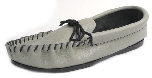 These English Moccasins Slippers are made in Northamptonshire and available in  Black or tan leather and Tan Suede.  These comfortable yet hardwearing soft leather slippers are ideal for lazing around the house in a traditional moccasin style. Stitch work to the upper finishes off the classic look.