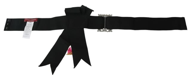 Authentic Dolce & Gabbana Crystal Waist Belt with Flower Brooches
  Brand new with tags and box
  Baroque belt for dress
  Crystal and brass flower brooches
  Ribbon included
  Made in Italy
  Quality craftsmanship
  Material: 80% Cotton 40% Acetate
Material: 80% Cotton 40% Acetate
