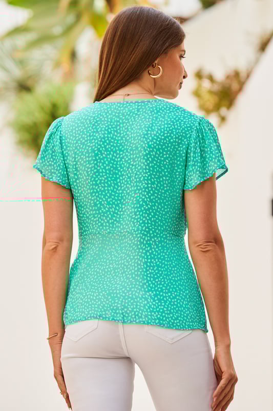 REASONS TO BUY:

Your jeans will love it
Fabulously feminine details
Bust-flattering V-neck and empire line cut
Delicate angel sleeves
Figure-skimming peplum hem
Just add jeans or denim shorts.