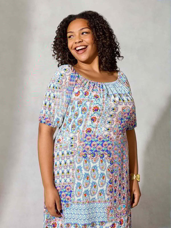 Details

Elastic bardot neckline
Short sleeves with gathered elastic cuffs
Side split in hem
Maxi length
Empire seam

Garment Care

Composition: 98% Viscose 2% Elastane
Machine washable  

Sizing

Model height: 5ft 10inches/178cm
Length from back neck to hem: 111cm

Printed all over with a pretty mosaic print, this maxi dress is cut from a soft woven fabric that moves beautifully. It has an elasticated neckline which can be worn on or off the shoulder, as well as short, elasticated sleeves which create an elegant silhouette when paired with its empire seam and side split at the hemline.