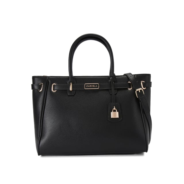 The Carvela Violet Belted Tote bag features a textured black upper that is accented with a branded belt around the straps. Dimensions: 25cm (H), 34cm (L), 15cm (D). Strap length: 126cm.