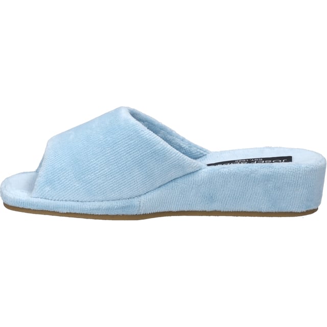 Mit dem Marseille 01 in iceblue präsentiert JOSEF SEIBEL einen Hausschuh, der Gemütlichkeit und Qualität neu definiert. Dieser Damenschuh, gefertigt in der innovativen AGO-Machart, verbindet das Obermaterial aus weichem Frottee mit einer strapazierfähigen Gummisohle, die für außergewöhnliche Rutschfestigkeit und Abriebfestigkeit steht. Die Relax-Kollektion, vormals bekannt als Westland, garantiert nicht nur eine perfekte Passform, sondern auch eine Fertigung, die weit entfernt von Fast Fashion ist. Der Marseille 01 ist ideal für den Indoor-Bereich, bietet durch sein Frottee-Innenleben ein angenehmes Tragegefühl und eignet sich perfekt für den entspannten Alltag zu Hause. Die Besonderheit dieser Schuhe liegt in ihrer Langlebigkeit und ihrem Tragekomfort, was sie zu einem unverzichtbaren Basic für den Sommer macht.