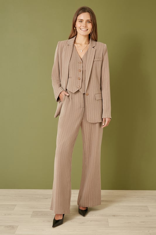 This blazer is perfect for adding some serious style points to your wardrobe. The pinstripe fabric is lightweight and looks incredible with the matching trousers and waistcoat sold separately. The fit is tailored slightly for a sophisticated look. With a single button fastening and pocket details.