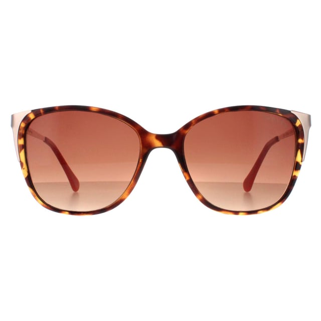 Las gafas de sol Radley Cat Eye Womens Tortoise Brown Romala tienen una sofisticada montura de acetato de ojo de gato que es ligera y resistente, lo que garantiza una comodidad y un uso duraderos. Las lentes proporcionan una protección UV excepcional, Adornado con sutil marca Radley en los templos, estas gafas de sol exuda lujo discreto, por lo que es un accesorio versátil que complementa a la perfección cualquier equipo.