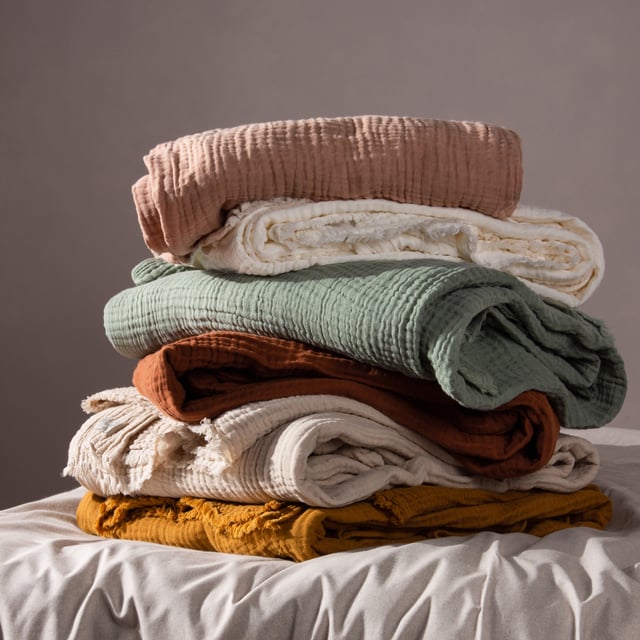 In muted earthy tones and solidly crafted from super soft, woven blends of yarn, the Morni throw instantly creates a warm, understated style for your soft furnishings. The design is complimented by tassel fringing on two sides and is ideal if you love to build up textures within a modern, neutral interior.