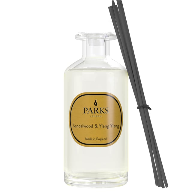 Soothing and balmy, Sandalwood & Ylang Ylang is reminiscent of the glow of sunset. Intriguing and lush, ylang ylang
 is a uniquely vibrant floral note between the raspy richness of a jazz singer's voice and soft sweetness of tropical fruits, whilst sandalwood is creamy and intense. Hints of spicy nutmeg, petally jasmine and fresh bergamot create lift and depth. Perfect wherever you want a warm and sensual ambiance.