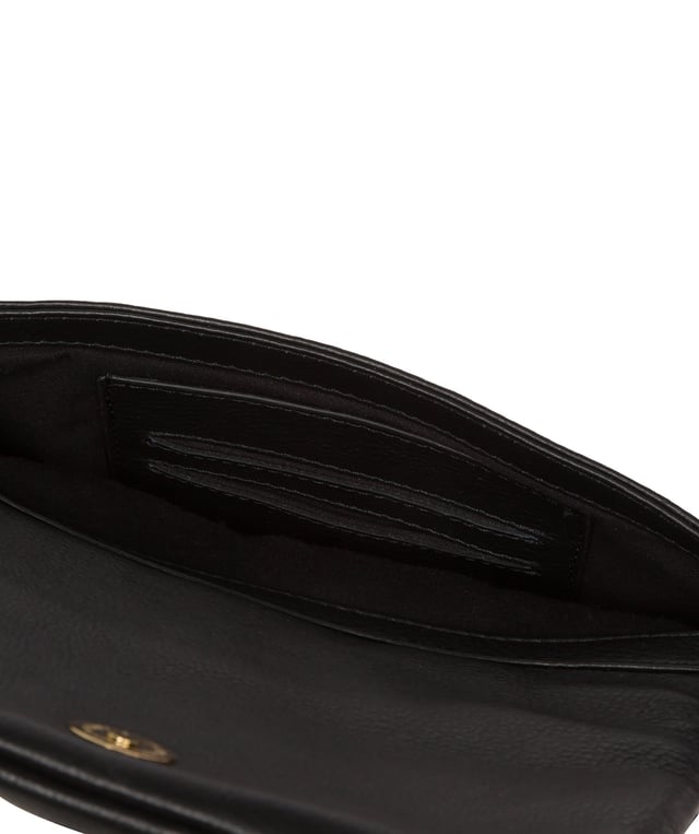 The 'Zoey' cross body bag from the Pure Luxuries London Marylebone Collection is handcrafted from high-quality, genuine Nappa leather with a natural super-soft touch. The fold-over top features an eye-catching quilted design and is secured by a magnetic press stud. The interior is lined with 100% cotton and includes two card slots, to help keep maintain an organised bag. Comes with an adjustable slim leather strap, with a drop length of 65cm. The Pure Luxuries logo is embossed in gold foil for a beautifully simple finishing touch.