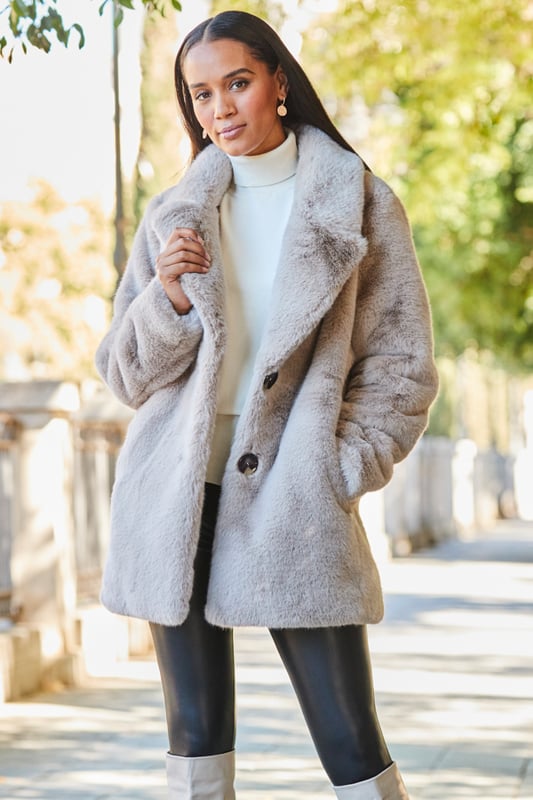 Like wearing your duvet. But chicer
Made from the softest, snuggliest faux fur
Flattering single-breasted fit
Fully-lined for extra warmth
Throw it over a party look for old-school glamour
Style with a jumper, jeans and boots for winter walks