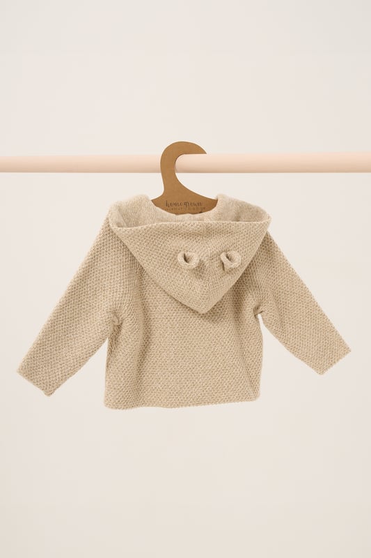 Homegrown's organic cotton hooded wrap cardigan is crafted for comfort and sustainability. Featuring button fastening and cute bear ears on the hood, this cosy, breathable cardigan is gentle on delicate skin and perfect for any season.