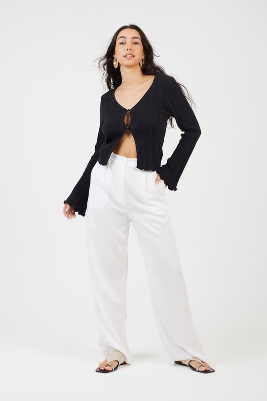 Enhance your style with this open-front ribbed cardigan from Brave Soul. Crafted from 100% cotton and features an open front with two button fastening, wide sleeves, and lettuce cuffs. Team with a pair of wide-leg trousers for an elevated stylish look. Model wears UK size S.