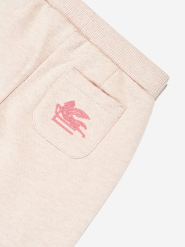 Introducing the luxurious Baby Girls Joggers in Beige by Etro, a designer essential for AW2024 that promises both elegance and comfort for your little one.  Premium Fabric: Crafted with high-quality materials ensuring durability and softness.   Classic Beige Shade: Perfectly versatile, blending seamlessly into any baby's wardrobe.   Designer Craftsmanship: Etro's signature detail ensures a sophisticated and stylish look.  Elevate your Baby, Baby_Girl, Girl's collection with these exclusive joggers from Etro. Order now and let your child experience style and comfort in one!