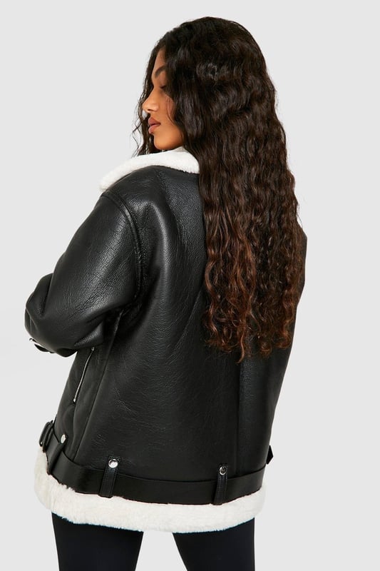Take your outfit to new style heights with an aviator jacket. Perfect for layering, create a stylish oversized silhouette as you choose from crop belted jackets to faux fur lined options. A cross between a classic flight jacket and a leather biker, it's all about the detailing with this snug winter staple. Pair your aviator coat with high waisted mom jeans and a fierce attitude as you stroll your way through your social calendar.Style: Aviator JacketFabric: PULength: Regular