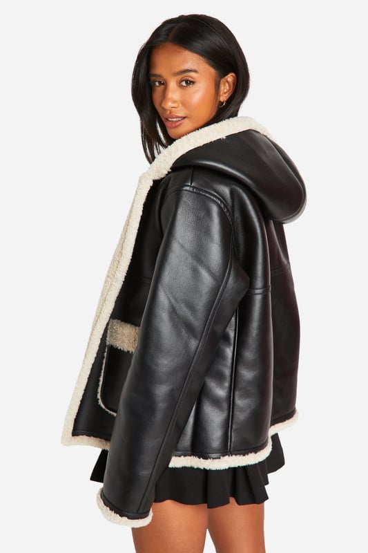 Keep toasty this season with our collection of petite coats and jackets. From petite trench coats to petite teddy coats, our coats for petite women are specifically designed to fit all you girls sitting pretty at 5'3'' and under. Step out in a petite blazer or pass the vibe check in a petite puffer jacket. Whatever your style, we've got you, girl. This one would look dreamy with a pair of straight leg jeans, an oversized hoodie and chunky trainers.Style: Aviator JacketNeckline: Hooded