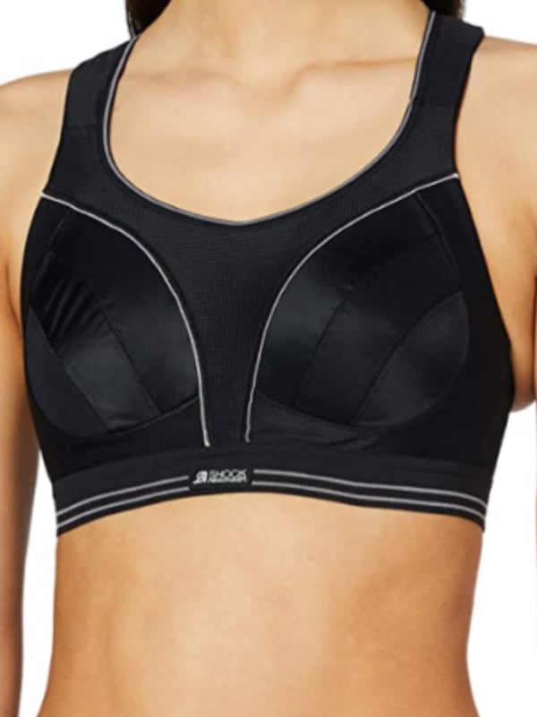 Shock Absorber Ultimate Run Bra. Infinity-8 support system with seamless inside and wide padded adjustable straps. High visibility and full back opening. Moisture-wicking. Product is recommended hand-wash only.