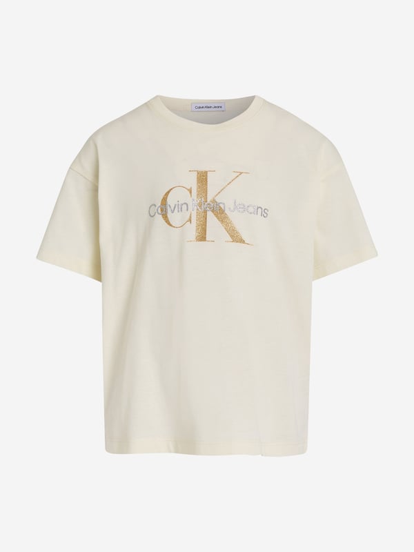 Introducing the Girls Glitter Monogram Boxy T-Shirt in Ivory by Calvin Klein Jeans, a quintessential piece for AW2024. Luxuriously tailored for the discerning young lady, this t-shirt blends elegance with a dash of playfulness. Key features include: **Chic Monogram Design**: Embellished with glittering Calvin Klein monogram for a touch of glamour. **Premium Quality Fabric**: Crafted from the finest materials for unmatched comfort and durability. **Versatile Ivory Shade**: A timeless hue that complements any outfit effortlessly. Elevate her wardrobe with this exquisite garment today!
