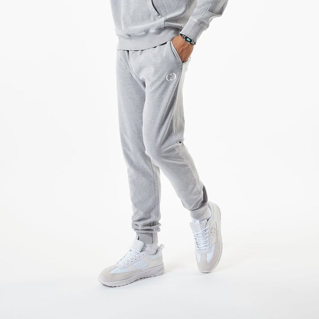 ﻿'POLAR TECH'

Description:

The Slub Joggers in Grey with contrast drawstring. Complete the set with slub hoodie in Grey.


Details:

Grey
Front Logo on the pocket
Ribbed hem and cuff
Composition & Care:

100% cotton.
Machine wash according to care label instructions.

Fit:

Regular
Model is 6ft and wear size M