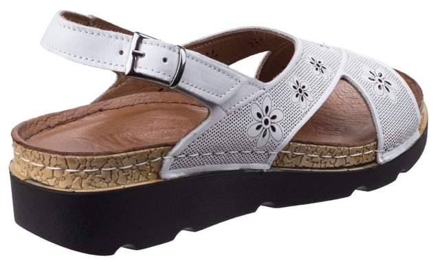 Stylish and comfortable wedge sandal from Italian inspired brand Riva. The attention is in the detail with floral decorations and supple leather uppers showcased on a sporty-look platform wedge. Soft and supple leather uppers. 
Perforated floral details and patterns. 
Criss-cross open toe design. 
Sling back strap with buckle closure. 
Anatomically designed cushioned leather foot bed.