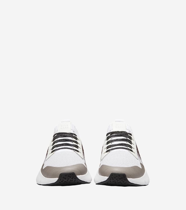 Made from a tactile combination of lightweight Stitchlite, the zonally-engineered stitch upper provides custom breathability while a leather heel cup ensures dynamic support with Grand.OS energy foam in the thick rubber outsoles for comfort all day Grand.OS energy foam. 
Zonally-engineered stitch upper. 
Leather Heel Cup.