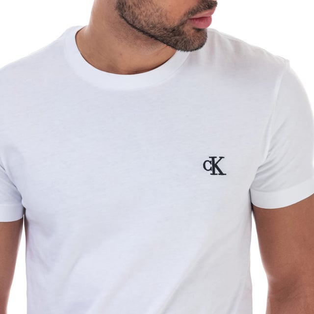 Mens Calvin Klein Jeans Essential Slim Organic Cotton T-Shirt in bright white.<BR><BR>- Ribbed crew neck.<BR>- Short sleeves. <BR>- Embroidered Calvin Klein monogram logo at left chest.<BR>- Soft organic cotton jersey construction.<BR>- Slim fit. <BR>- 100% Organic cotton.  Machine washable.<BR>- Ref: J30J314544YAF