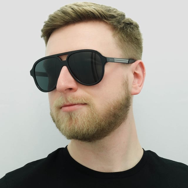 <p><span style="color: rgb(48, 55, 62); font-family: &quot;IBM Plex Sans&quot;, sans-serif; font-size: 14px; white-space-collapse: preserve;">Gucci Aviator Mens Black Grey GG0688S  Gucci are a large pilot style with a plastic frame front and flat metal temples finished with the Gucci text logo.</span></p>