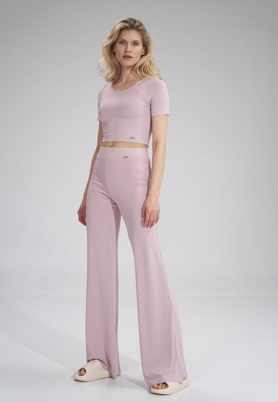 Long flared pants, wide elastic waistband, no pockets, no zippers.