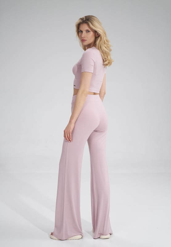 Long flared pants, wide elastic waistband, no pockets, no zippers.