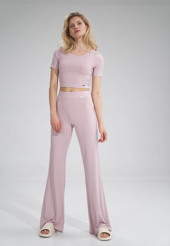 Long flared pants, wide elastic waistband, no pockets, no zippers.