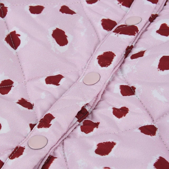 Lightweight cotton mix quilted jacket with our bespoke painted dot print in pale pink with burgundy dots. Inside lining and ribbed collar in matching burgandy jersey to the burgundy dots to give our little ones extra warmth and comfort. Features press stud front opening for ease of dressing.