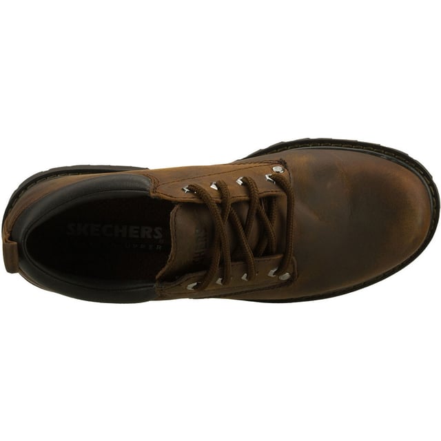 Skechers Tom Cats Leren Heren Donkerbruine Veterschoenen Ga op jacht in de Skechers Tom Cats Oxford. Sterk leren bovenwerk in een casual dress creeper-stijl oxford met een effen neus, versterkte naden, stikdetails en vetersluiting.