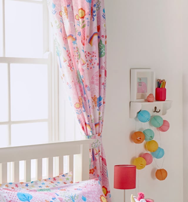 Send your child to wonderland with the Unicorn curtains. These gorgeous children's curtains have a pencil pleat header making them a good fit for any window area and come fully lined. The Unicorn curtains come with two fully matching, stainless steel ringed tiebacks. Specifically made to coordinate with the matching Riva Home Unicorn duvet set, toy and wall mural for a truly immersive experience.