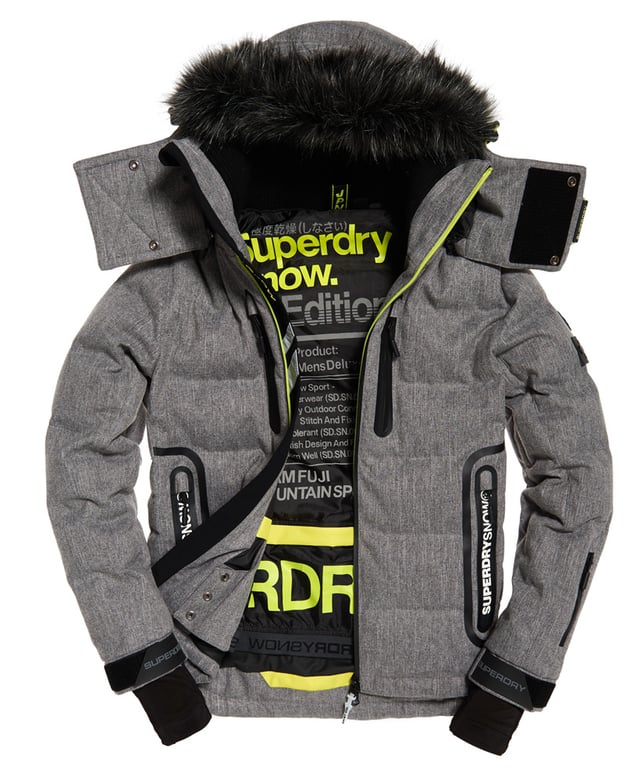Superdry men’s Deluxe Nordic snow puffer jacket. This padded weather tolerant jacket with an inner ribbed collar, detachable hood with a removable faux fur trim and a taped seam zip fastening is perfect for hitting the slopes in. The Deluxe Nordic snow puffer jacket features five outer pockets – one with a detachable goggle cloth, hook and loop fastened cuffs with thumbholes and zip fastened armpit ventilation. Inside, the jacket has a removable snow skirt and a single internal pocket with earphone routing. The jacket is finished with Superdry branding on the zips, placket, shoulder and arms. Water resistance  10,000mm 
Breathability  10,000g
Snow seals and coated zipsModel wears: Medium Model height: 6’ 1” (185cm) Model chest size: 38" (96cm)