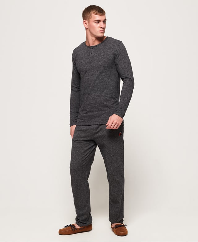 Superdry men's SD Laundry organic cotton grandad top. This luxuriously soft top is perfect for lounging in, featuring a button down fastening and long sleeves. This grandad top is completed with a Superdry logo patch above the hem. Wear with a pair of our super soft joggers for the ultimate comfortable attire.Made using cotton grown using organic farming methods which minimise water usage and eliminate pesticides, maximising soil health and farmer livelihoods.