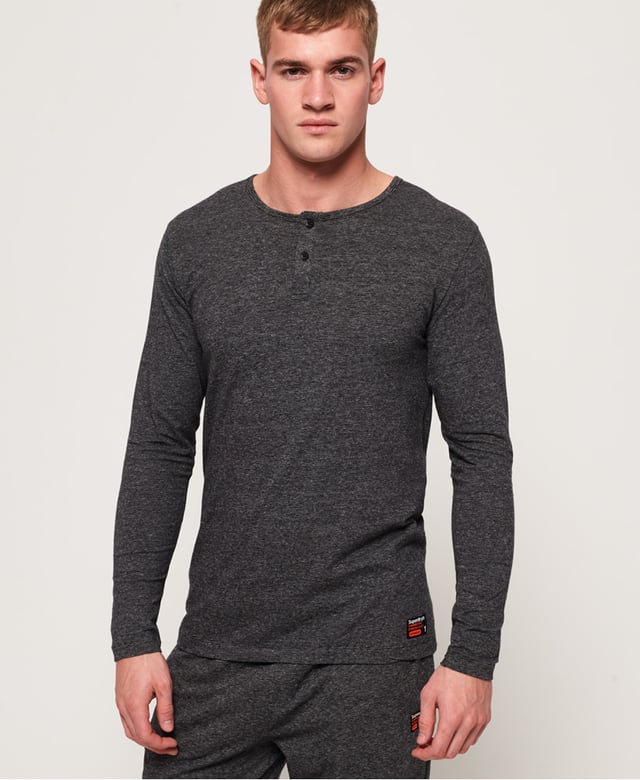 Superdry men's SD Laundry organic cotton grandad top. This luxuriously soft top is perfect for lounging in, featuring a button down fastening and long sleeves. This grandad top is completed with a Superdry logo patch above the hem. Wear with a pair of our super soft joggers for the ultimate comfortable attire.Made using cotton grown using organic farming methods which minimise water usage and eliminate pesticides, maximising soil health and farmer livelihoods.