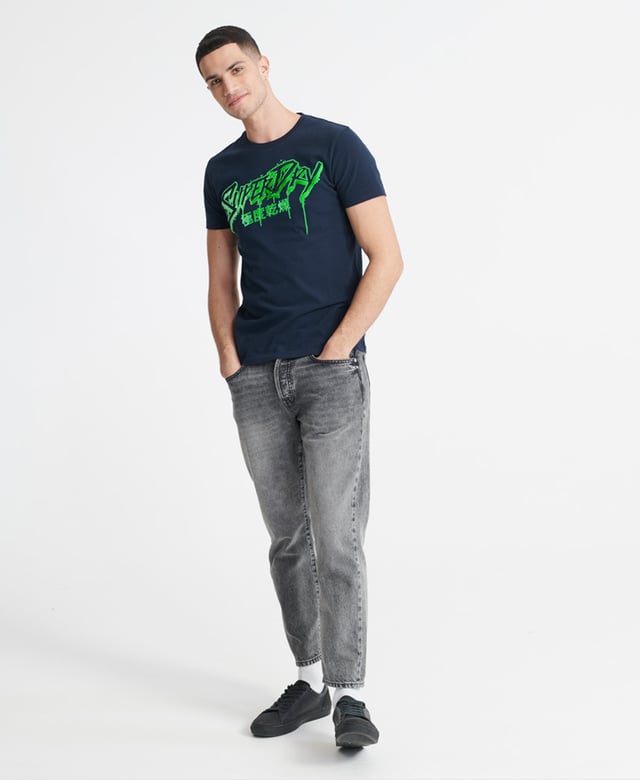 Superdry men's Neon classic t-shirt. A crew neck tee featuring short sleeves, and a textured neon Superdry print across the chest. Pair with jeans for a casual look with a neon twist.
