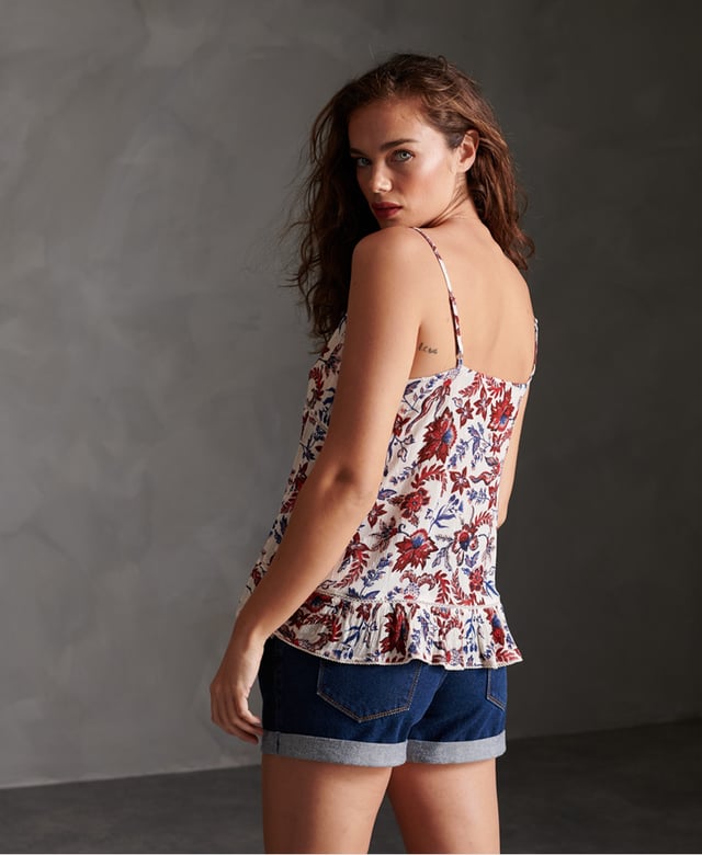 Superdry Summer Lace Cami Top Superdry women's Summer Lace cami top. This top features two thin straps and a frilled peplum hemline. Style this with your favourite jeans to complete the look this season.