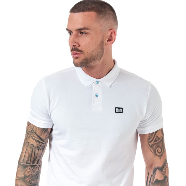 Mens Weekend Offender Barnum Polo Shirt in White.- Fold over collar.- Short sleeves.- Ribbed cuffs & collar.- 2 button placket.- Woven Weekend Offender brand patch at left chest.- Straight hem.- 100% Cotton.  Machine washable.- Ref:WOSPO501