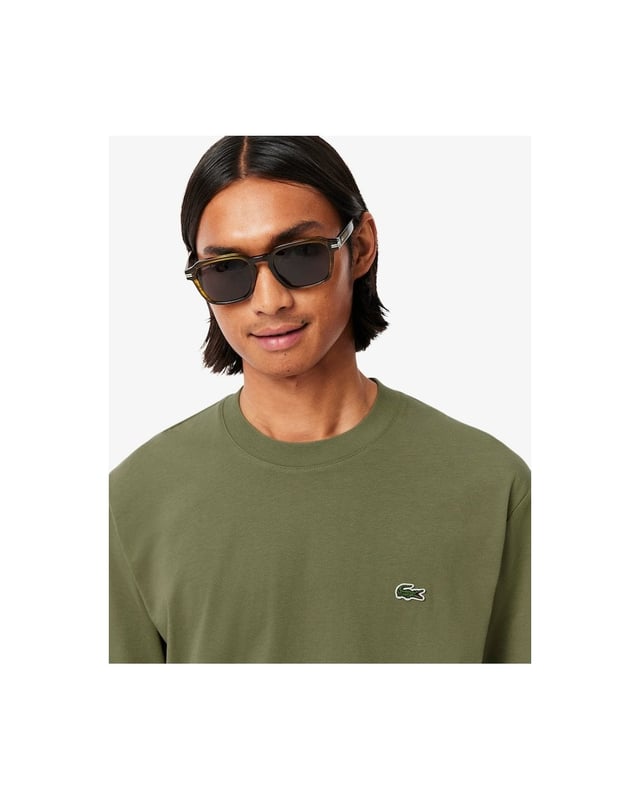 The timeless Lacoste tee gets an update in a super-comfortable mid-weight fabric. A versatile essential that goes with everything, finished with an iconic crocodile.

Weight: 180g/m²
Crew neck with hood
Classic, comfortable fit
Embroidered crocodile on chest

Cotton (100%)
TH7318
 