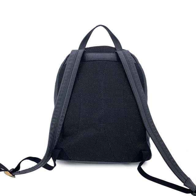 VINTAGE, RRP AS NEW
This beautiful Bag will come with a Certificate of ity provided by Entrupy. The certificate will be provided at no further cost  Elevate your daily style with this functional yet luxurious Gucci backpack. Crafted from rich black leather, this versatile piece is the perfect combination of sleek design and practicality. The front pocket, subtly accented with a vintage Gucci logo, adds a touch of heritage to the modern silhouette, making it an iconic statement for those who appreciate refined craftsmanship.  The zipper closure opens to reveal a spacious interior lined in beige fabric, offering plenty of room for your essentials-whether you're heading to work, running errands, or embarking on travel adventures. For added organization, the interior also features a side zip closure pocket, perfect for keeping smaller items secure. The adjustable shoulder straps ensure a customizable fit for ultimate comfort, making it the ideal companion for your daily commutes or getaway escapes. With its timeless appeal and effortless elegance, this Gucci backpack brings a touch of luxury to every journey. 'Gucci - Made in Italy' tag inside (with serial number on its reverse).    Condition Rating: B - VERY GOOD CONDITIONCondition Details: Gently used. Some stains on the internal lining. Some wear of use on bottom corners. Please check the photos carefully and ask if you need to know more details or if you have any doubts.Measurements (cm):Depth: 17.8Height: 38.1Length: 34.3Other Details: Dustbag? NoKeys? NoBox? No Measurments:  width: 178 mm length: 343 mm height: 381 mm