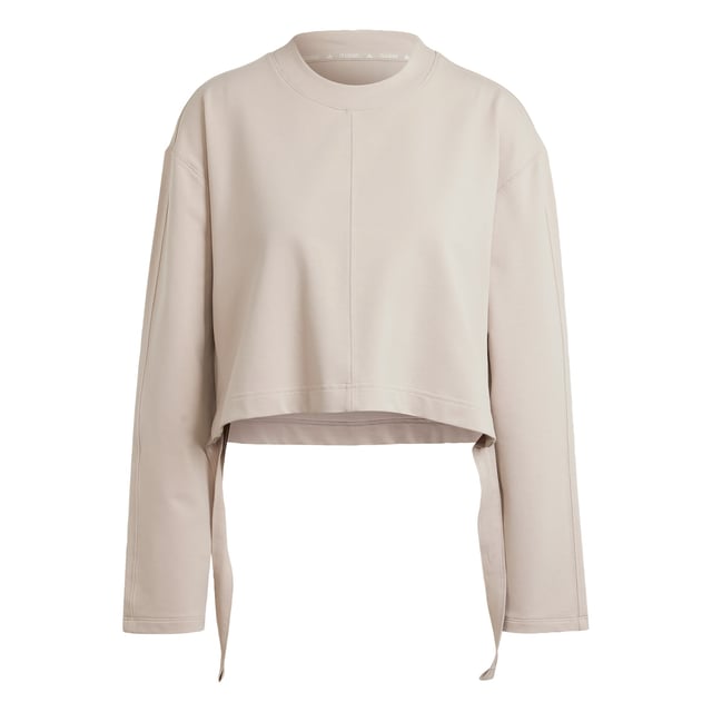 Take your yoga flow from studio to city in this yoga cover-up. Made for comfort inside and out, this soft French terry top keeps you cosy before, during and after your practice. adidas AEROREADY keeps you dry when the heat is on. Slightly cropped and with hem ties, this cover-up layers perfectly over your favourite yoga bra.By choosing recycled, adidas are able to reuse materials that have already been created, which helps to reduce waste. Renewable materials choices will help us to remove our reliance on finite resources. Our products made with a blend of recycled and renewable materials feature at least 70% total of these materials.  -