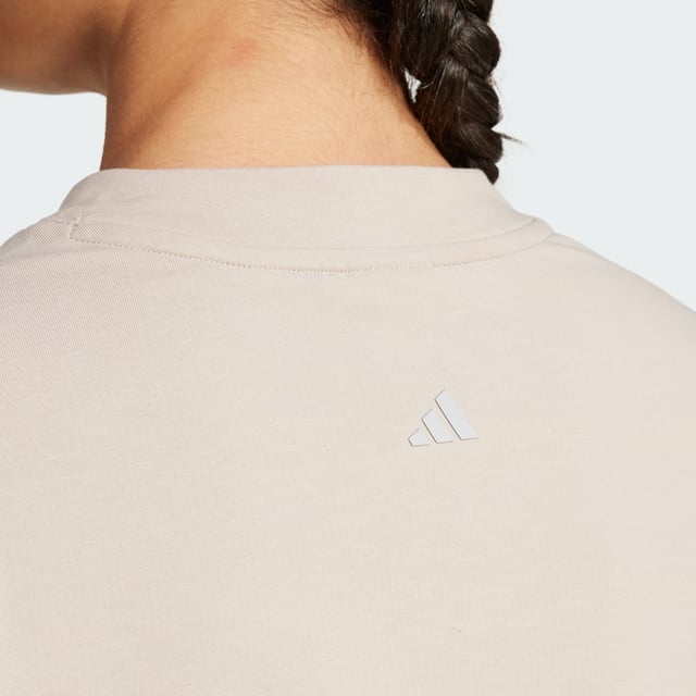 Take your yoga flow from studio to city in this yoga cover-up. Made for comfort inside and out, this soft French terry top keeps you cosy before, during and after your practice. adidas AEROREADY keeps you dry when the heat is on. Slightly cropped and with hem ties, this cover-up layers perfectly over your favourite yoga bra.By choosing recycled, adidas are able to reuse materials that have already been created, which helps to reduce waste. Renewable materials choices will help us to remove our reliance on finite resources. Our products made with a blend of recycled and renewable materials feature at least 70% total of these materials.  -