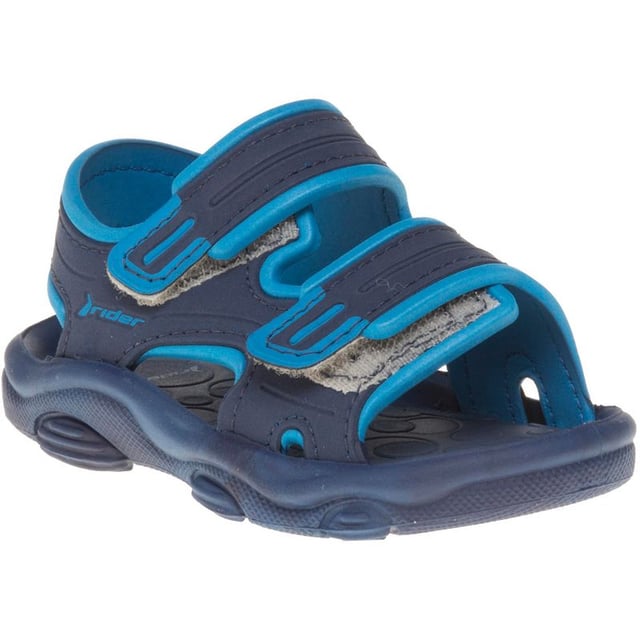 Cuida los dedos de los pies pequeños esta temporada con la sandalia Baby RS2 de Rider. Este zapato de verano azul cuenta con correas de velcro para un ajuste perfecto y una plantilla acolchada para mayor comodidad.