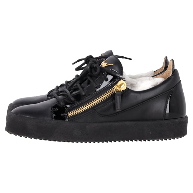 VINTAGE, RRP AS NEW
The Giuseppe Zanotti Frankie Zipper Detail Sneakers in black leather redefine casual luxury with their sleek, modern design. Crafted from premium leather, these sneakers feature bold zipper details that add a distinctive edge to the classic low-top silhouette. The contrasting metallic hardware and signature Zanotti logo elevate the style, making these sneakers the perfect fusion of comfort and high fashion. Ideal for both streetwear enthusiasts and sneaker collectors, they offer versatile wear for any occasion.

Styling Tip: Pair these edgy sneakers with distressed jeans and a graphic tee for a cool, laid-back vibe. For a more refined look, wear them with slim-fit trousers and a leather jacket, balancing the sporty design with sophisticated touches for a fashion-forward street style.

 Giuseppe Zanotti Frankie Zipper Detail Sneakers in Black Leather

Condition: Excellent
Signs of wear: Include Box., No visible sign of wear. No Mark at insole.,  Very light mark at soles.
Packaging: Box, Dust bag
Color: Black
Material: Leather | leather
Size: IT | 39.5
Measurements: Heel height: 30; Insole length: 280
SKU: TONPUGBSH457072W