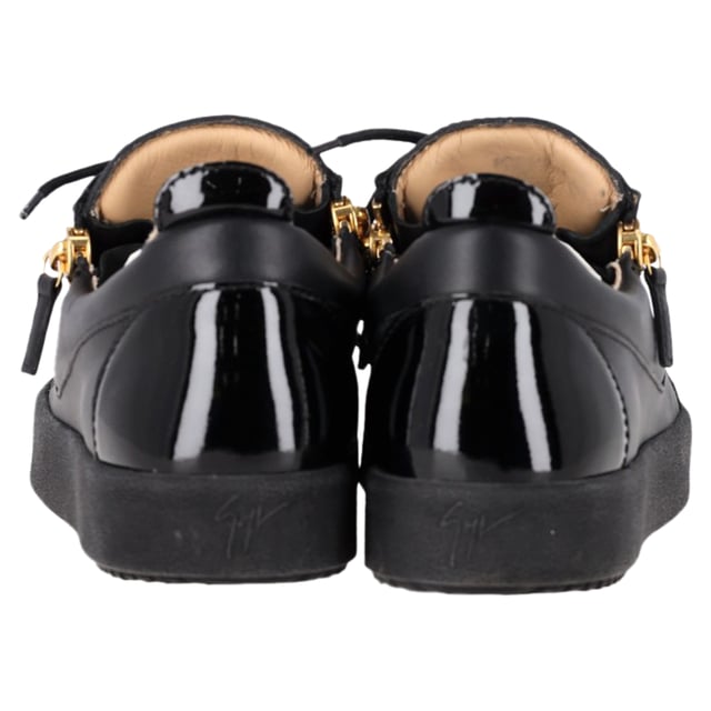 VINTAGE, RRP AS NEW
The Giuseppe Zanotti Frankie Zipper Detail Sneakers in black leather redefine casual luxury with their sleek, modern design. Crafted from premium leather, these sneakers feature bold zipper details that add a distinctive edge to the classic low-top silhouette. The contrasting metallic hardware and signature Zanotti logo elevate the style, making these sneakers the perfect fusion of comfort and high fashion. Ideal for both streetwear enthusiasts and sneaker collectors, they offer versatile wear for any occasion.

Styling Tip: Pair these edgy sneakers with distressed jeans and a graphic tee for a cool, laid-back vibe. For a more refined look, wear them with slim-fit trousers and a leather jacket, balancing the sporty design with sophisticated touches for a fashion-forward street style.

 Giuseppe Zanotti Frankie Zipper Detail Sneakers in Black Leather

Condition: Excellent
Signs of wear: Include Box., No visible sign of wear. No Mark at insole.,  Very light mark at soles.
Packaging: Box, Dust bag
Color: Black
Material: Leather | leather
Size: IT | 39.5
Measurements: Heel height: 30; Insole length: 280
SKU: TONPUGBSH457072W