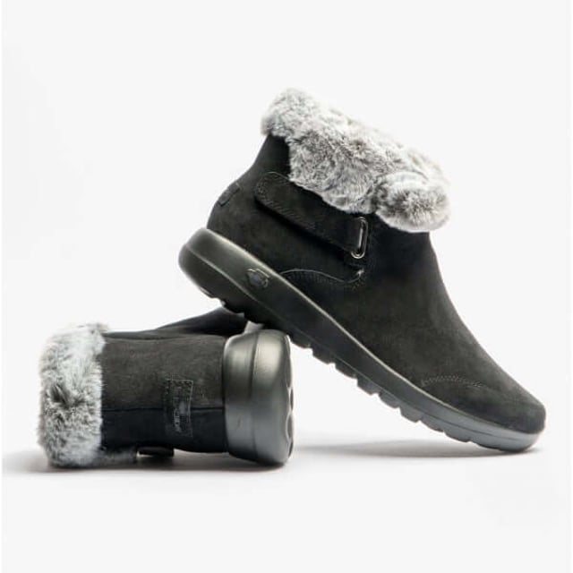 Enjoy the season in plush comfort with Skechers On-the-GO Joy First Glance. This slip-on cold-weather bootie features a 3M Scotchgard treated suede upper with a faux-fur trim and lining plus a Skechers Air-Cooled Goga Mat insole.