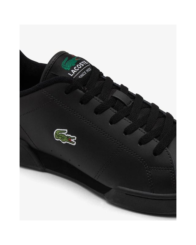 Lacoste Mens Carnaby Cup Sneakers A new addition to the Carnaby family, the Carnaby Cup is a modern-meets-classic sneaker. The shoes look to its predecessors as reference and evolve its features with a fresh outlook. Finished with the iconic crocodile to the side and a woven Lacoste label at the tongue, it’ll elevate your new-season wardrobe seamlessly.Leather upperDouble-stitch details for a sporty feelClassic crocodile branding on quarterTextile tongue with classic woven labelRubber outsole
