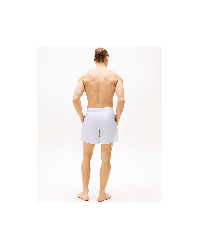 Tommy Hilfiger Medium Drawstring Stripe Mens Swim Shorts Bring retro seaside styling to your swimwear collection with these mid-length swim shorts, designed to showcase the Ithaca stripe.
Highlights
• Recycled polyester swim fabric
• All-over Ithaca stripe
• Elasticated drawstring waist
• Two waist slip pockets
• Mesh lining
• Tommy Hilfiger logo on side
• Tommy Hilfiger branding
Shape & fit
• Classic fit
• Inseam 12.5cm, Outseam 40.5cm
Composition & care
• 100% recycled polyester
UM0UM03265